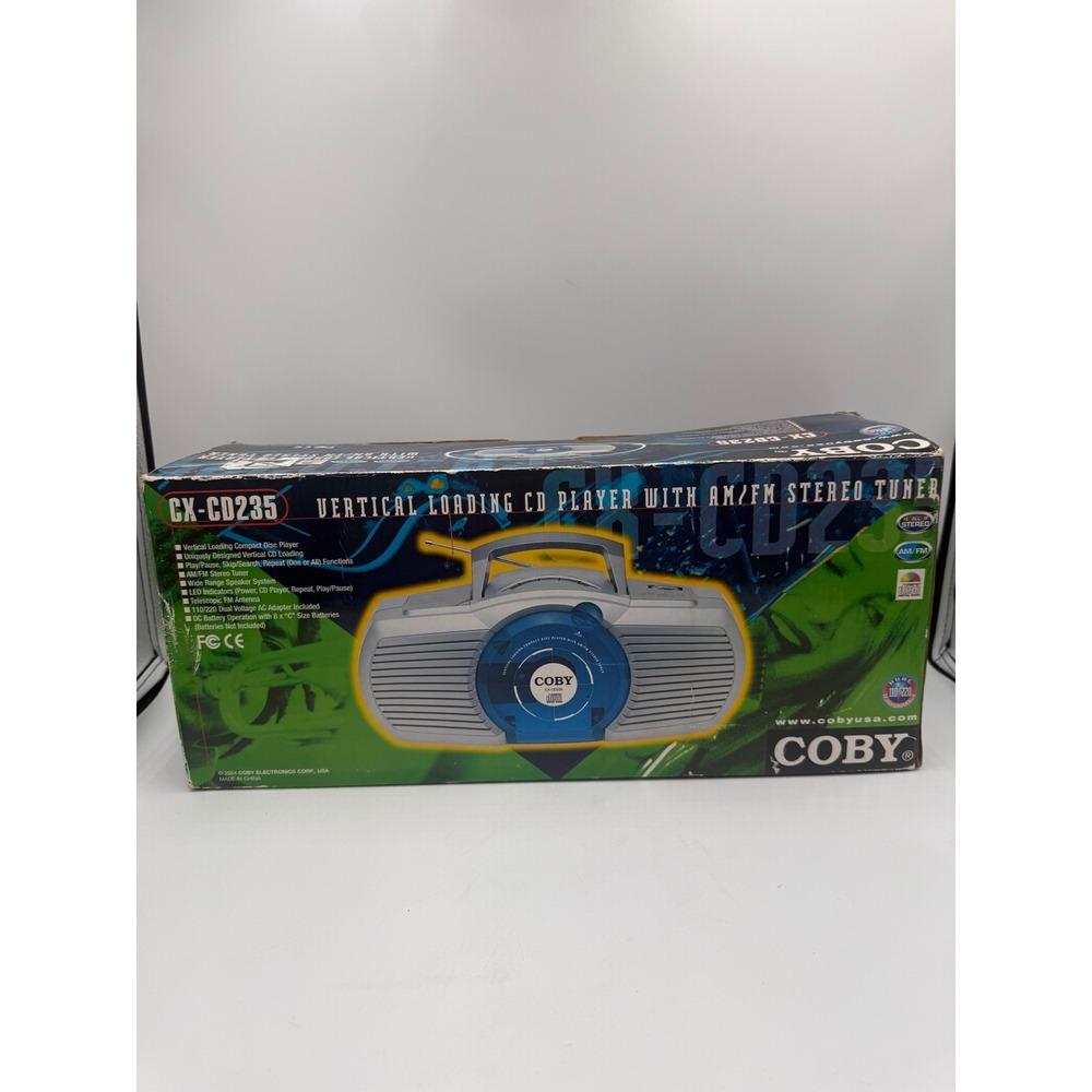 Coby CX-CD235 Vertical Loading CD Player AM/FM Stereo Tuner Silver Blue Boombox